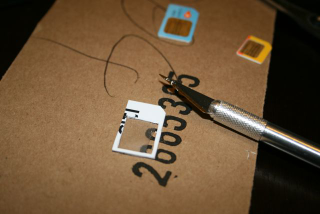 Illustration for article titled How to Make a DIY Micro SIM to SIM Adapter